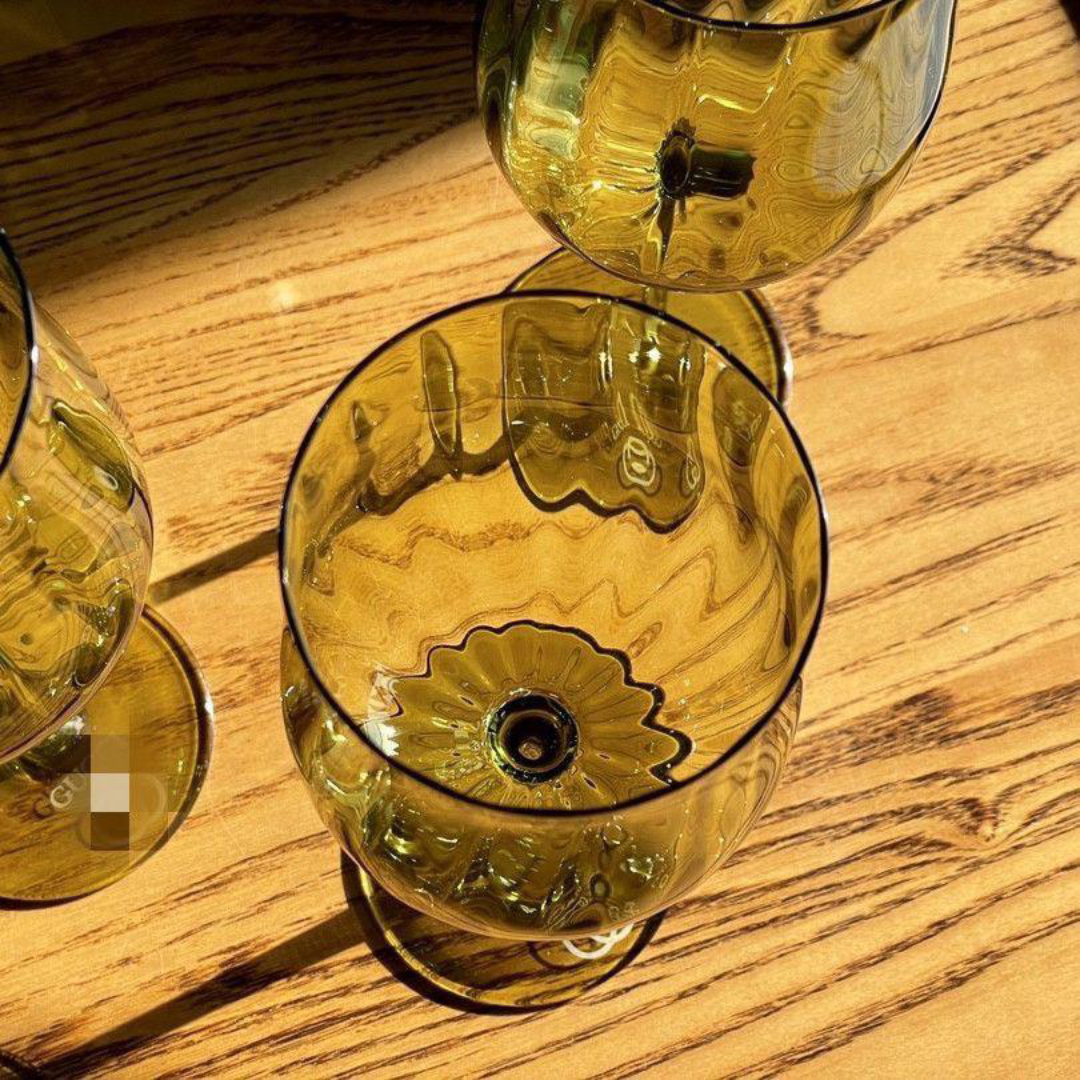 Gucci green-tinted wine glasses
