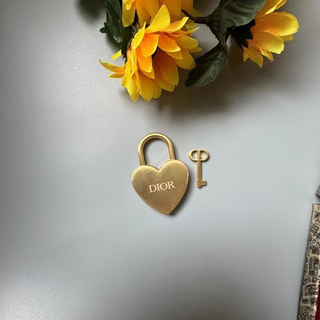 Dior Valentine's Day gift gold metal love lock with key