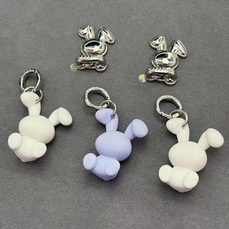 Casetify array of rabbit and heart-themed hooks and keychains