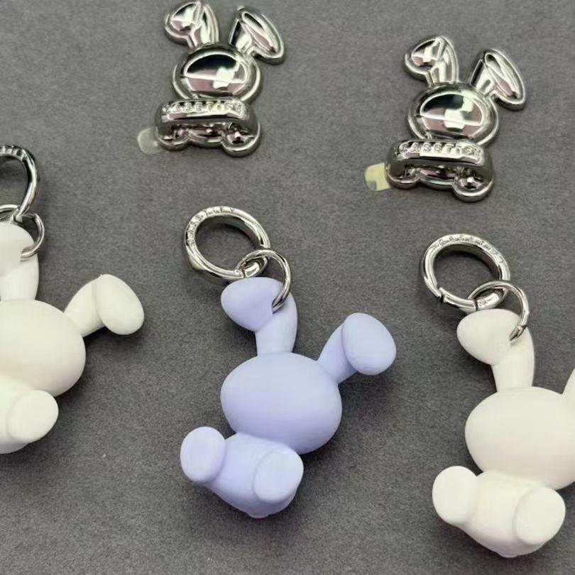 Casetify array of rabbit and heart-themed hooks and keychains